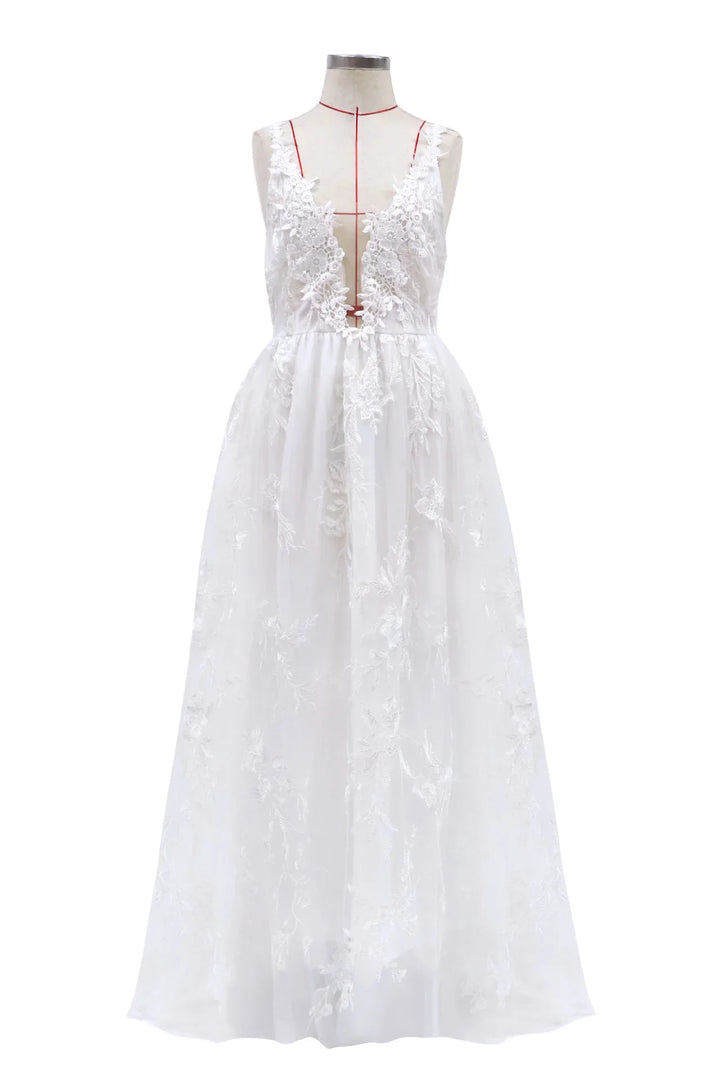 White sleeveless wedding dress with deep V-neck and floral lace embroidery on mannequin