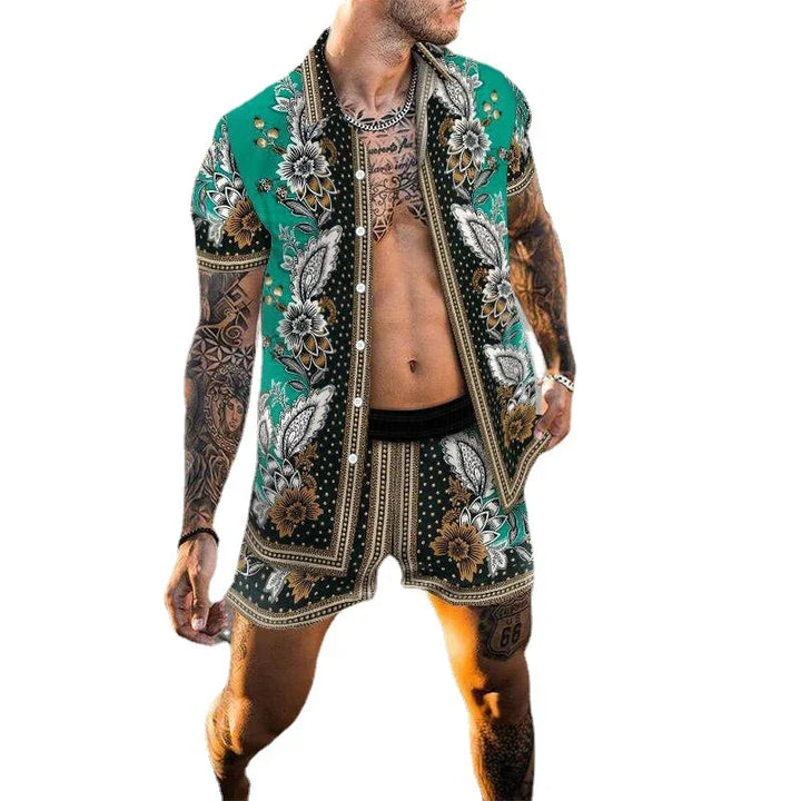 Man wearing green floral patterned short sleeve shirt and matching shorts with tattoos on arms and chest