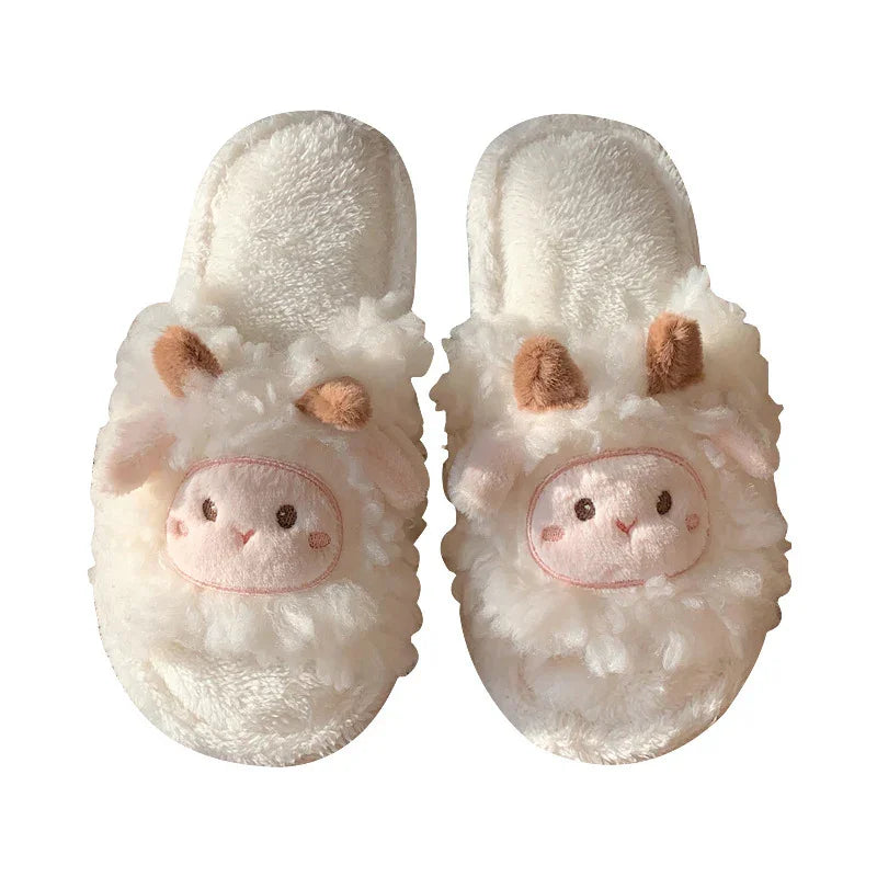 Pair of fluffy white slippers with cute cartoon sheep faces and brown ears