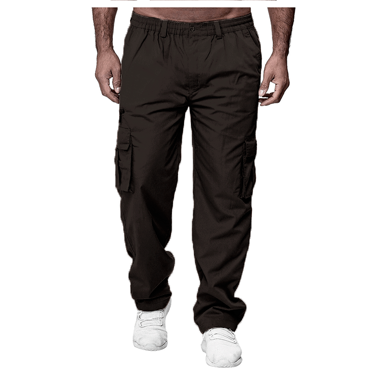 Men's black cargo pants with multiple pockets worn with white sneakers on white background
