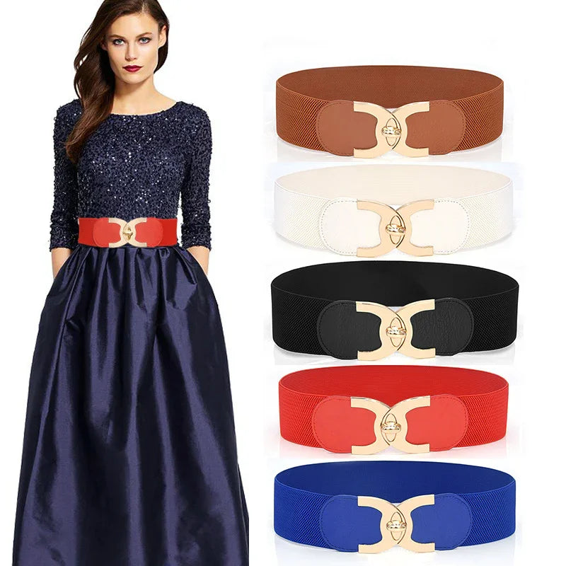 Woman wearing navy blue dress with red stretch waist belt; additional belts in brown, white, black, red, and blue with gold clasps