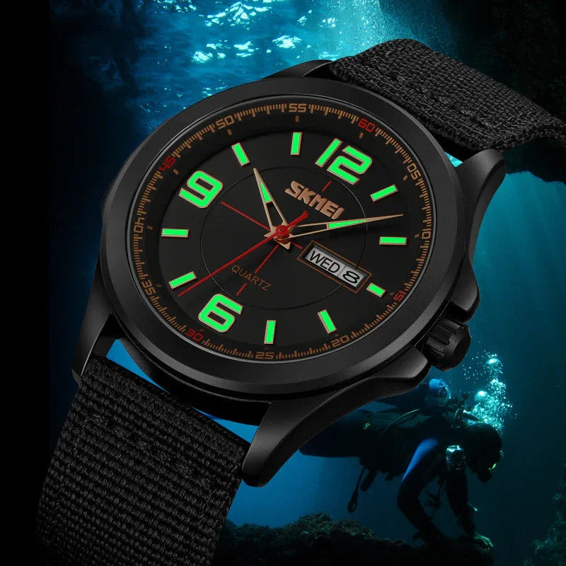 Black SKMEI quartz watch with glowing green numbers and black fabric strap, shown over scuba diving background