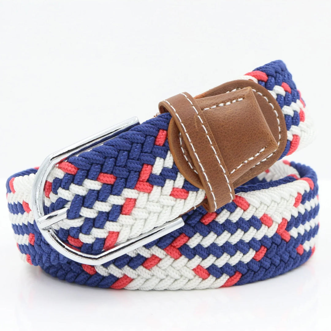 Braided fabric belt with navy blue, white, and red pattern and brown leather buckle detail