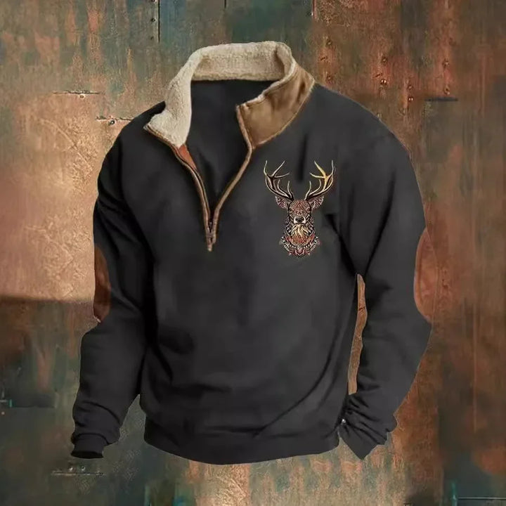 Black fleece pullover with brown leather elbow patches and detailed deer head embroidery on chest