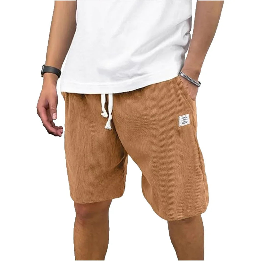 Man wearing casual brown corduroy shorts with white drawstring and white t-shirt