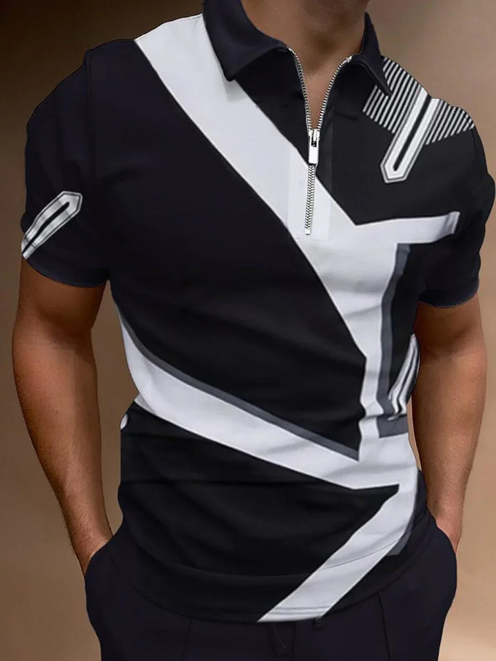 Man wearing black and white short sleeve polo shirt with zipper and geometric design