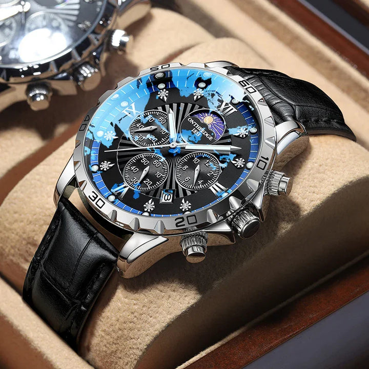 Luxury silver chronograph wristwatch with black dial, blue accents, moon phase, and black leather strap