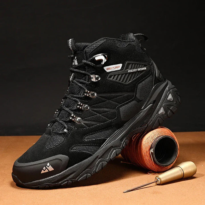 black hiking boot with rugged sole on rope roll with awl tool, outdoor footwear