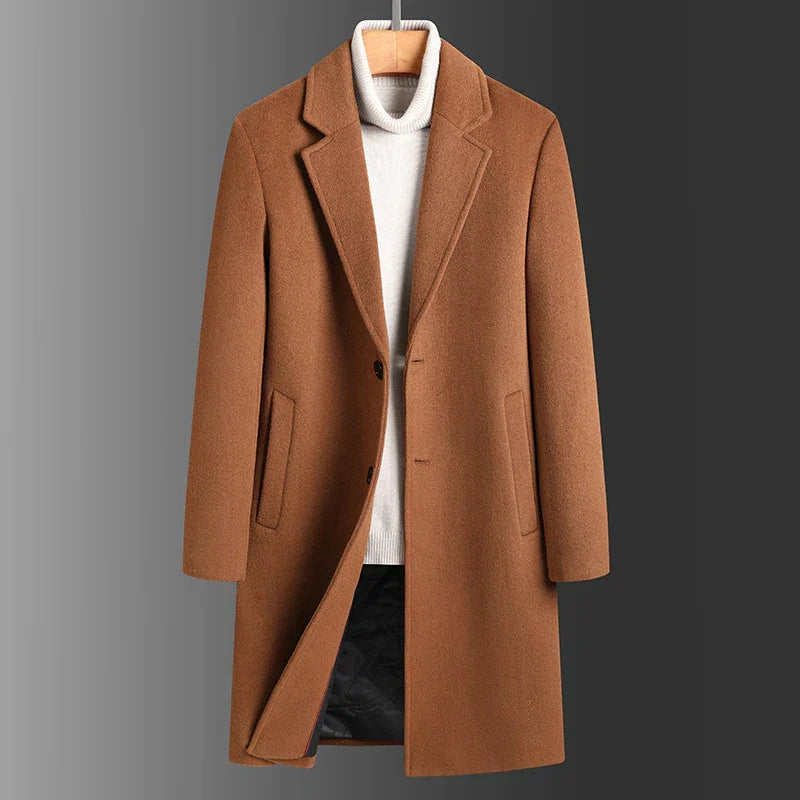 Men's camel brown wool overcoat with notch lapels and side pockets, styled with white turtleneck sweater