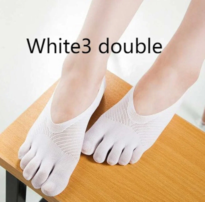 Feet wearing white toe socks on wooden surface with text 'White3 double'