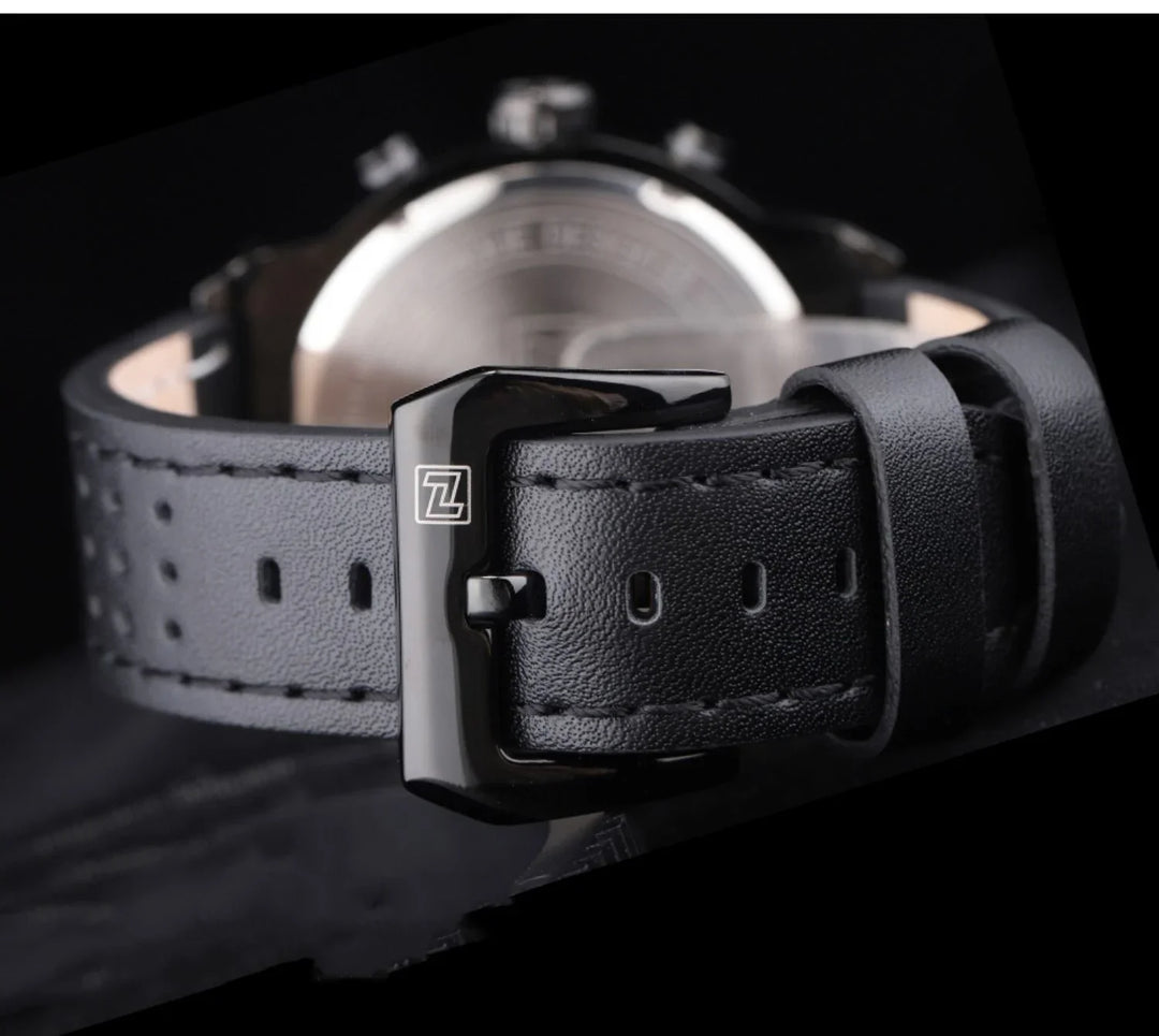 Close-up of black leather watch strap with stitched edges and black metal buckle featuring logo
