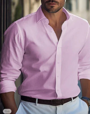 man wearing light pink button-up long sleeve shirt with white pants and brown belt
