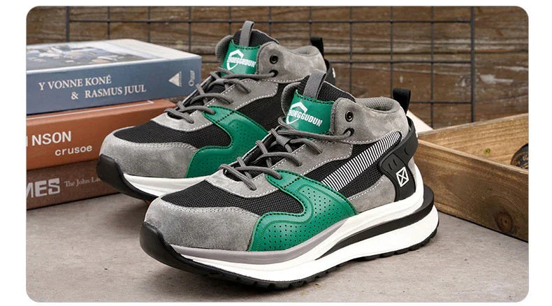 Gray and green casual sneakers with black mesh, white soles, and branded tongue on a concrete surface