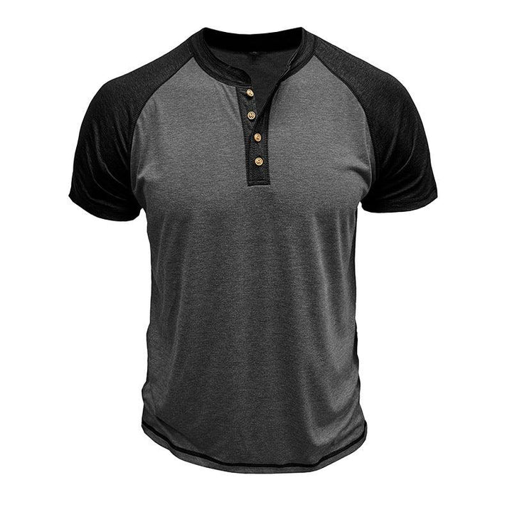 Men's short sleeve henley shirt in charcoal gray with black raglan sleeves and four wooden buttons