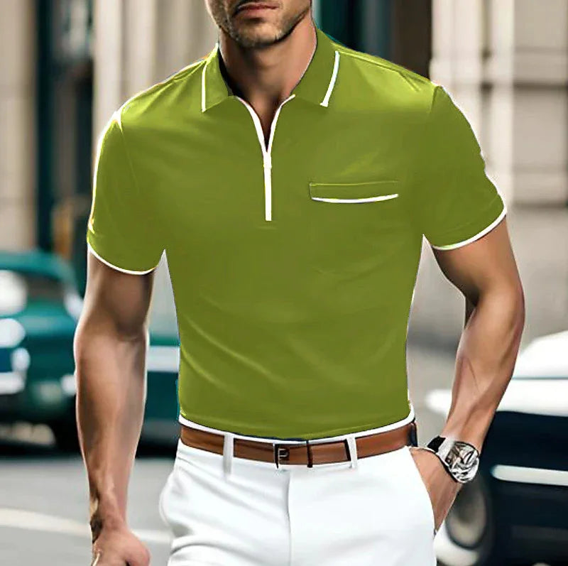Man wearing olive green polo shirt with white trim and white pants, casual urban fashion