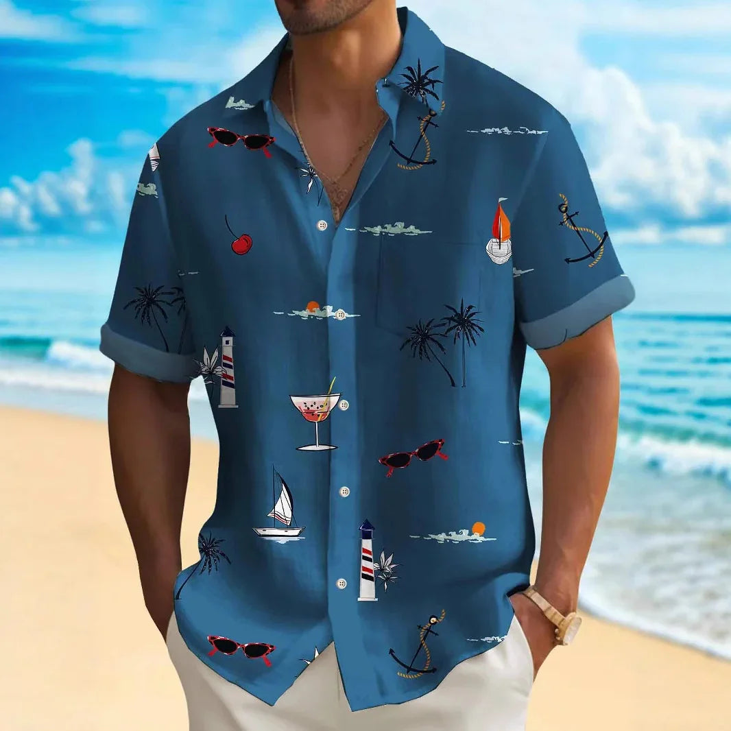 Men's blue tropical shirt with palm trees, sailboats, anchors, and cocktails, beach background