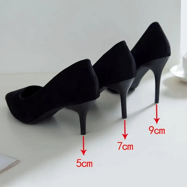 Three black high heel shoes with 5cm, 7cm, and 9cm heel height measurements displayed