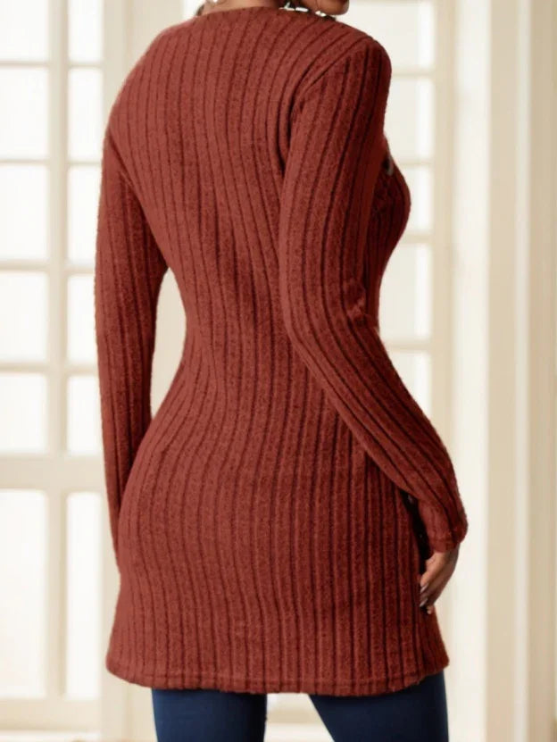 Back view of a woman wearing a fitted ribbed knit long sleeve rust brown sweater dress