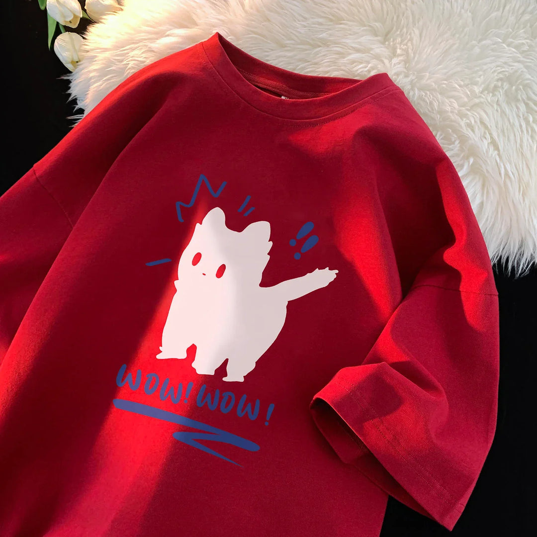 Red t-shirt with a cute white cartoon cat and blue text saying WOW! WOW!