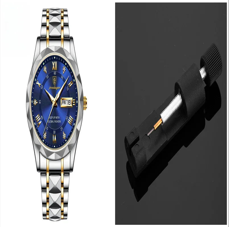 Two-tone silver and gold wristwatch with blue dial and date display next to black watch band spring bar tool