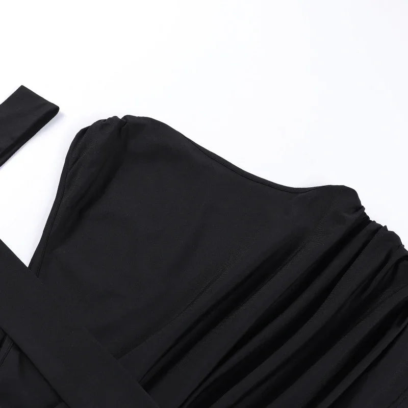 Black strapless dress with fitted bodice and flowing skirt on white background