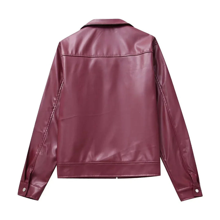 Back view of a maroon faux leather jacket with long sleeves and snap button cuffs on white background