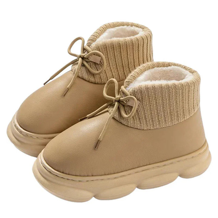 Beige winter boots with knit cuffs, fleece lining, and thick cushioned soles