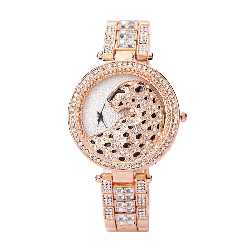 Rose gold women's wristwatch with crystal-studded leopard design and decorative band
