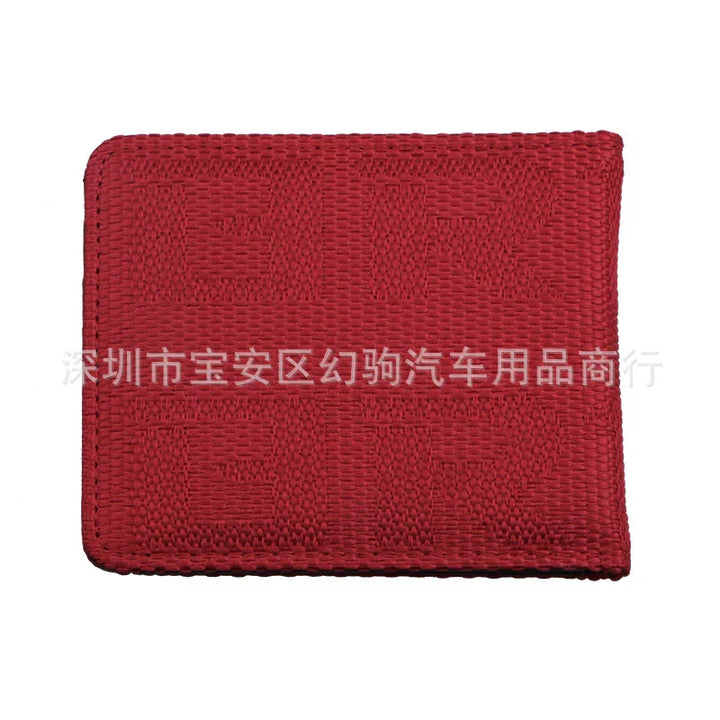 Red woven fabric patch with raised textured Chinese characters on white background