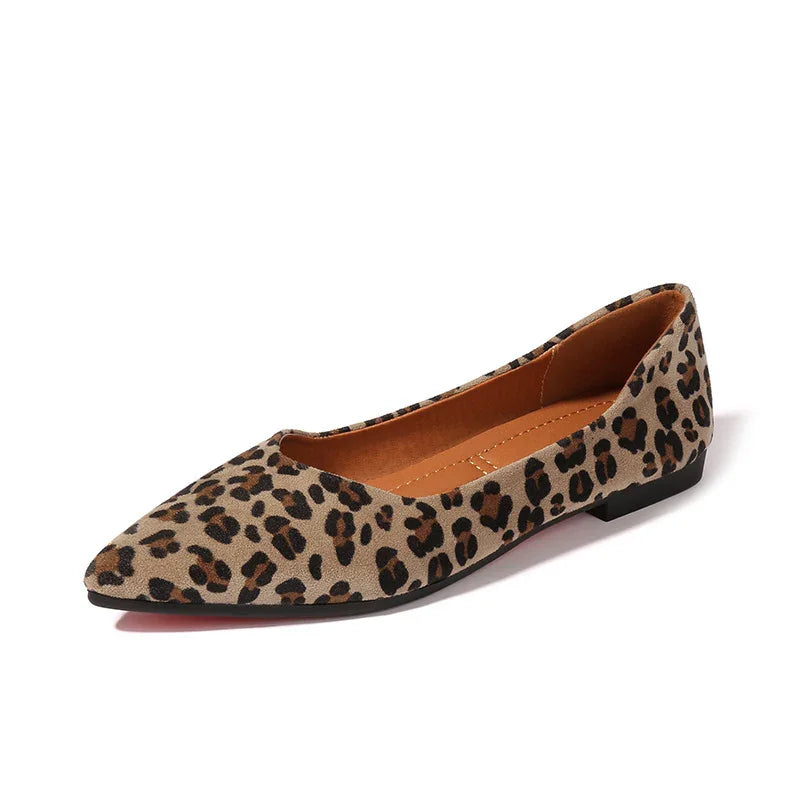 Leopard print pointed toe women's flat shoe with tan interior and black sole