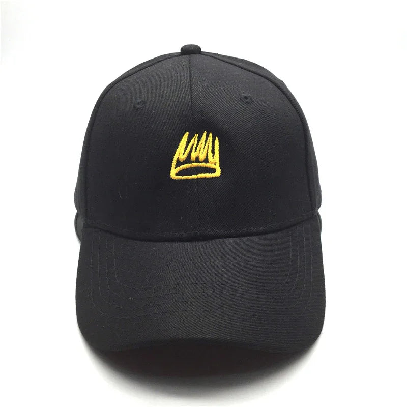 Black baseball cap with yellow embroidered crown logo on front