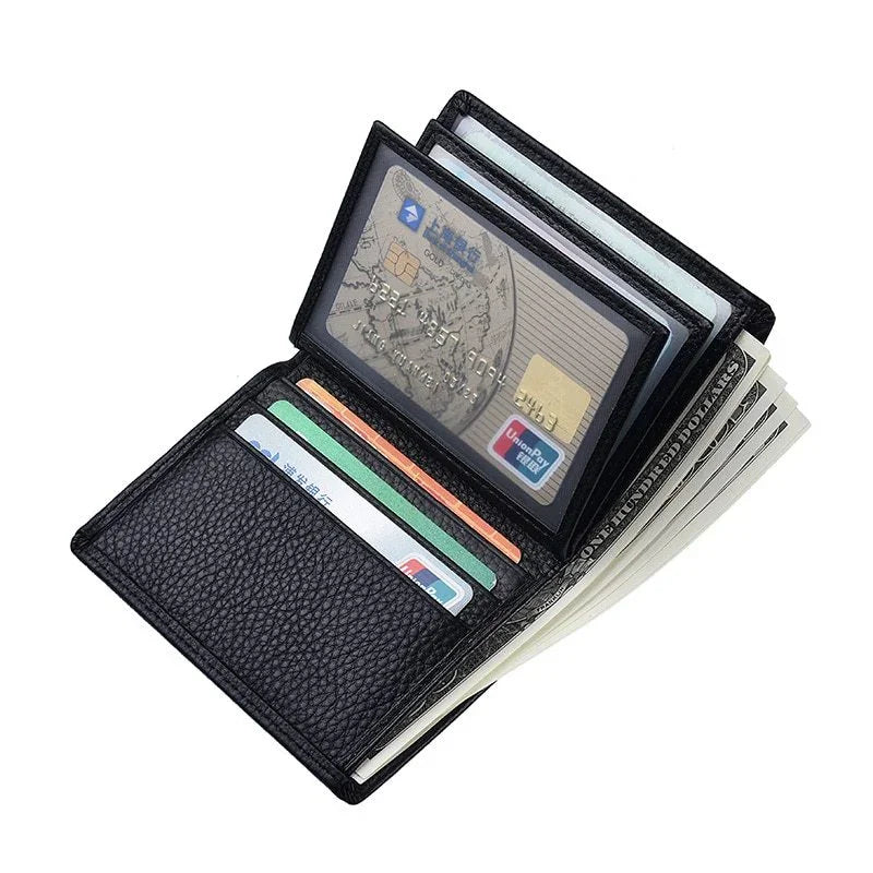 Black leather wallet open with visible credit cards and folded hundred-dollar bills inside