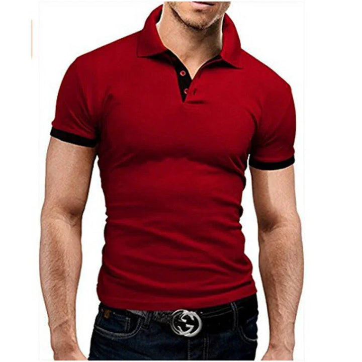 Men's fitted red polo shirt with black trim on collar and sleeves, paired with black jeans and designer belt