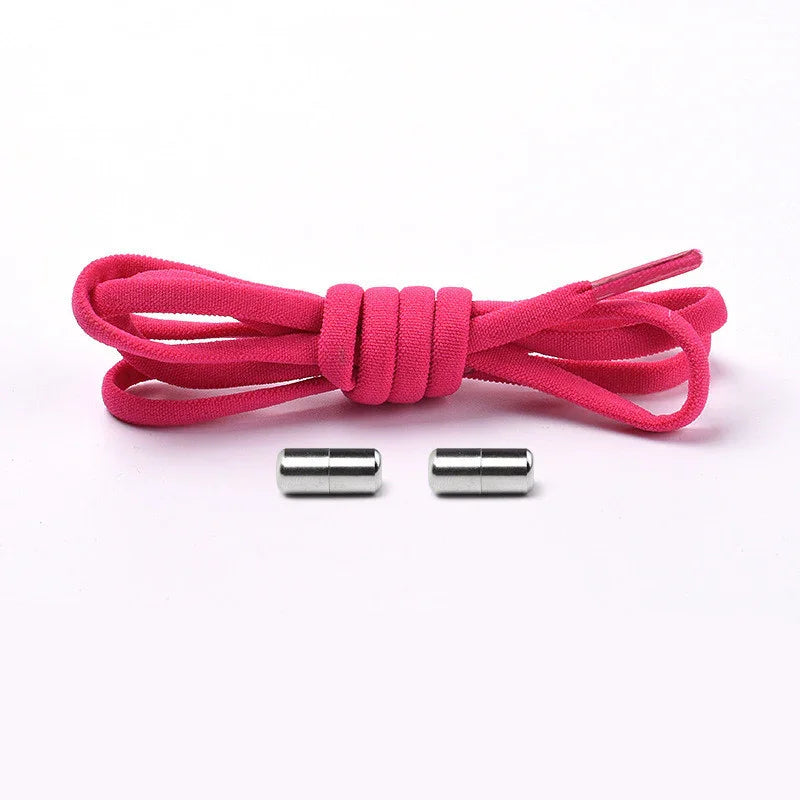 Pink elastic shoelace with two silver metal aglets on a white background
