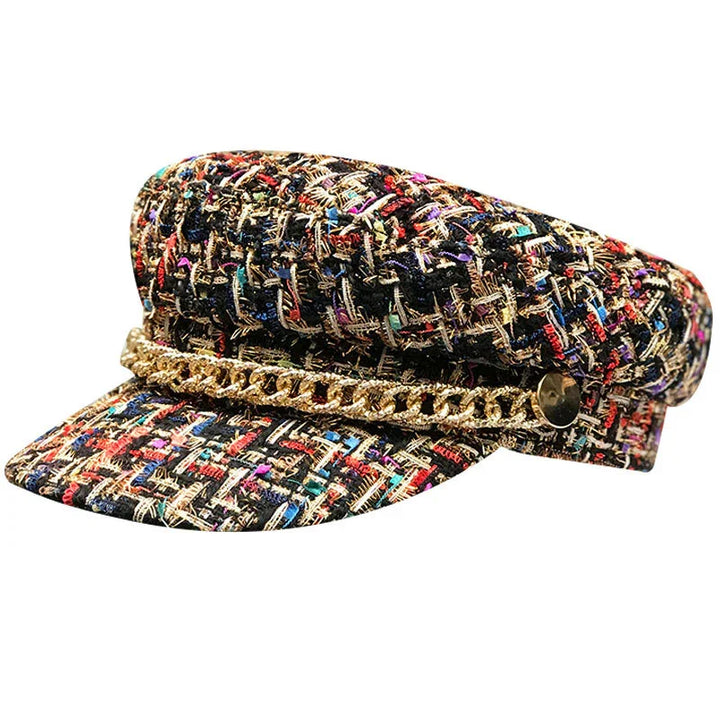 Colorful textured tweed baker boy hat with gold chain detail and button accents