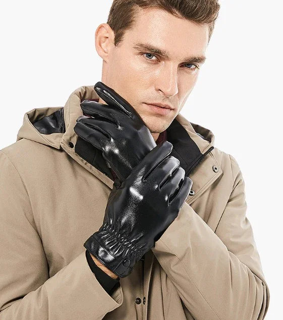 Man wearing shiny black leather gloves and a beige hooded jacket