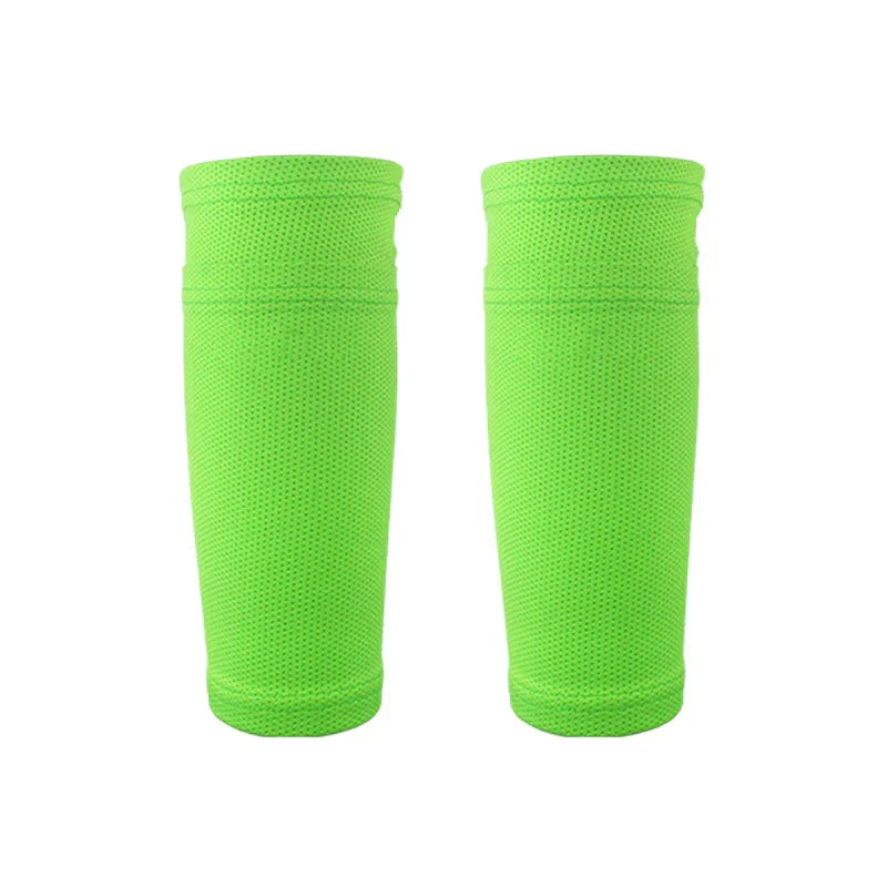 Pair of neon green mesh compression sleeves on white background