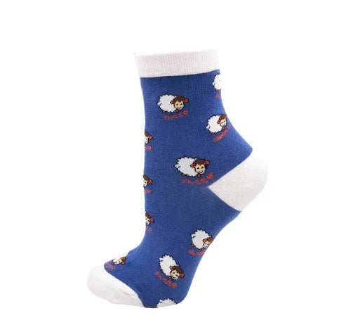 Blue ankle sock with white cuff, heel, and toe, featuring small white sheep and red text pattern