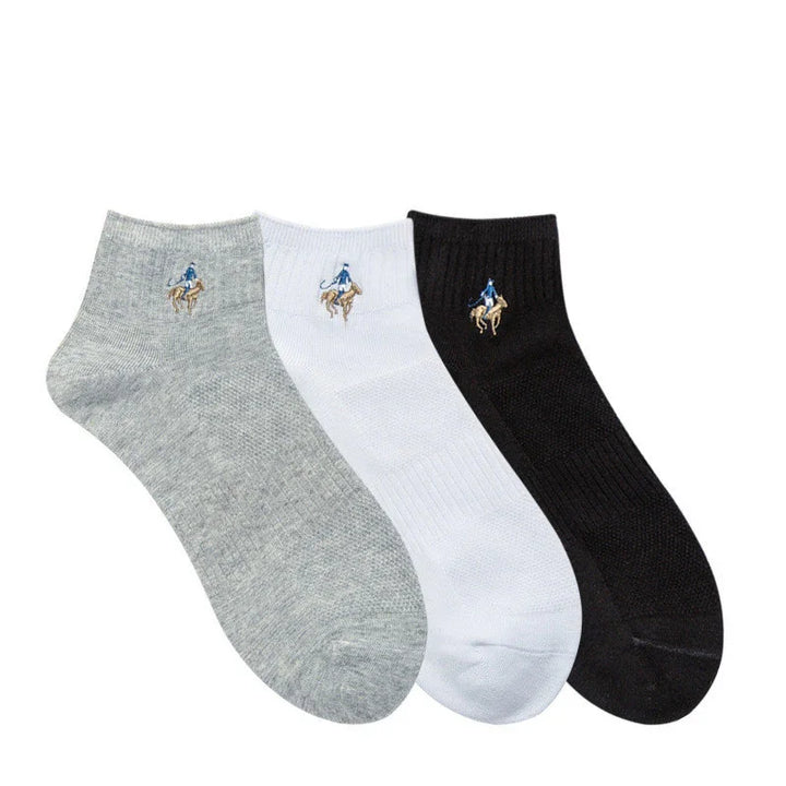 Set of three ankle socks in gray, white, and black with embroidered polo player logo