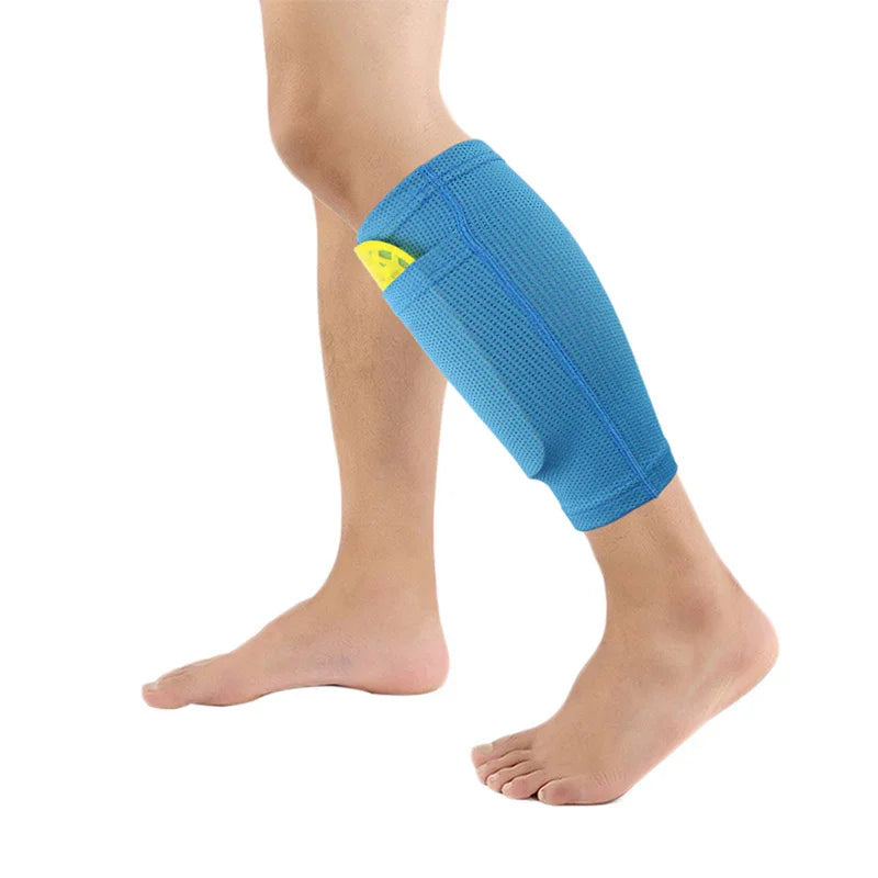 Blue calf compression sleeve with pocket on leg, yellow item tucked inside