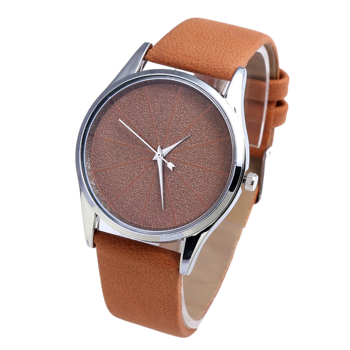 Brown leather strap wristwatch with textured brown dial and silver case