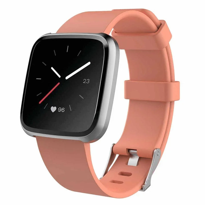 Smartwatch with black square display showing time, heart rate 96, and coral pink silicone band