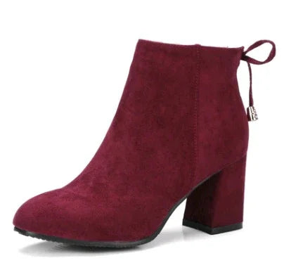 Women's burgundy suede ankle boot with block heel and decorative back tie detail