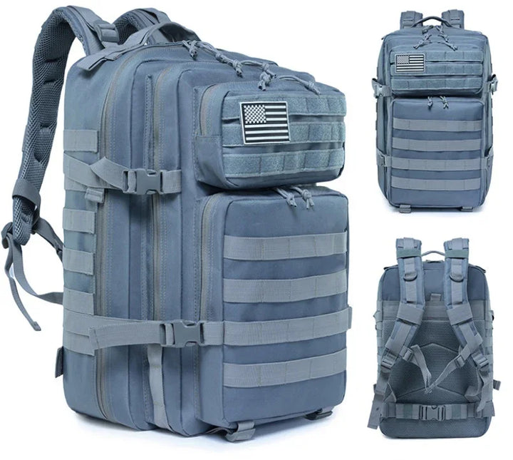 Blue tactical military backpack with multiple compartments, MOLLE straps, and American flag patch