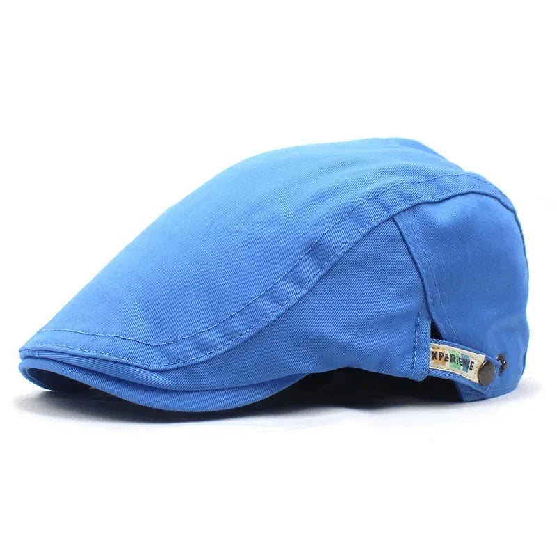 Blue cotton flat cap with stitched details and small side label