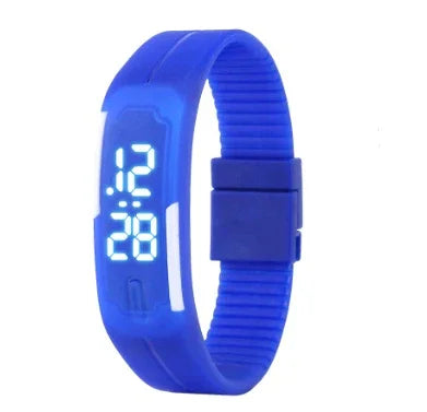 Blue digital sports watch with LED display showing 12:28 on silicone strap
