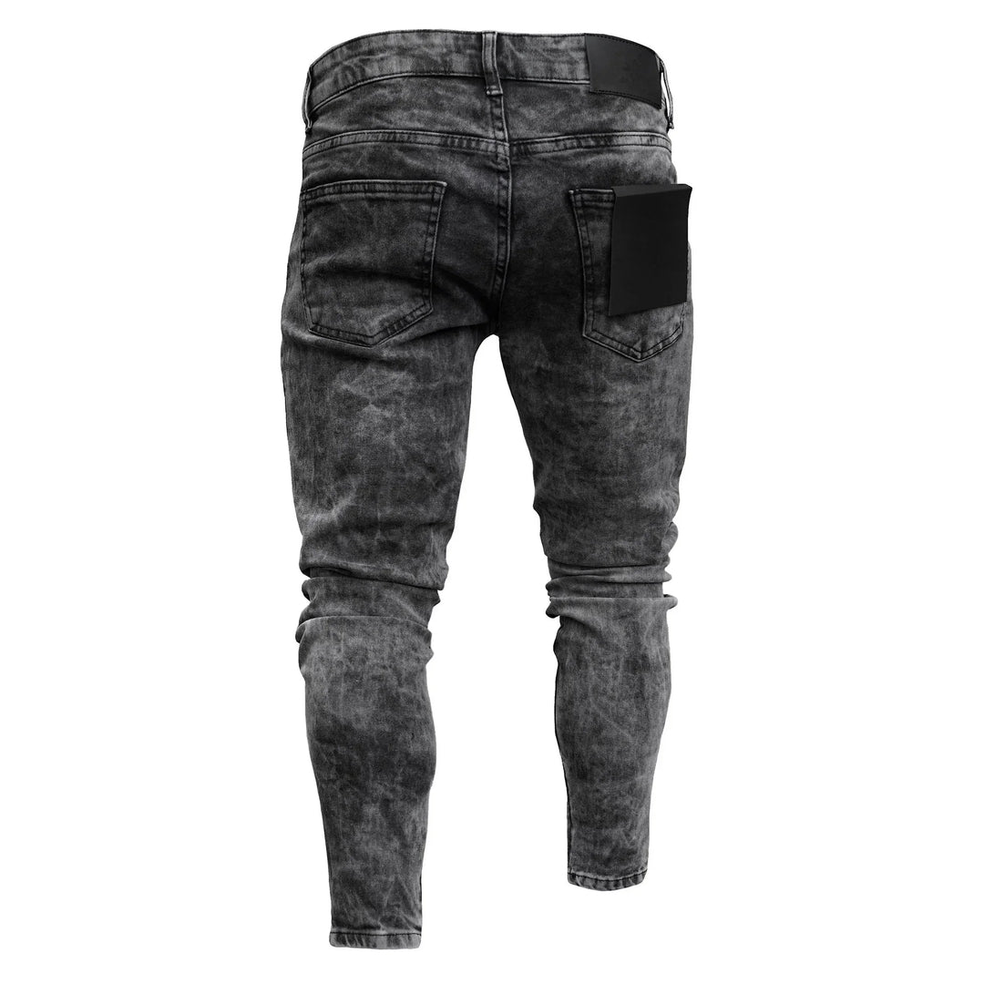 Back view of black acid wash skinny jeans with two rear pockets and black waistband patch