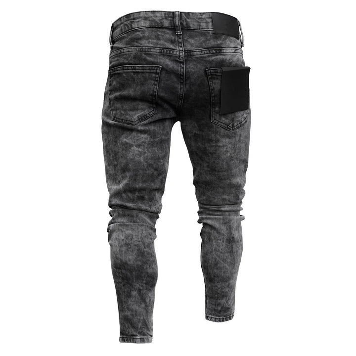 Back view of black acid wash skinny jeans with two rear pockets and black waistband patch