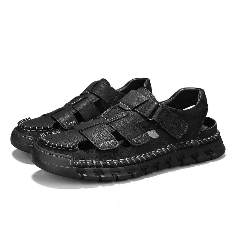Black leather men’s sandals with adjustable straps and stitching detail on rugged sole