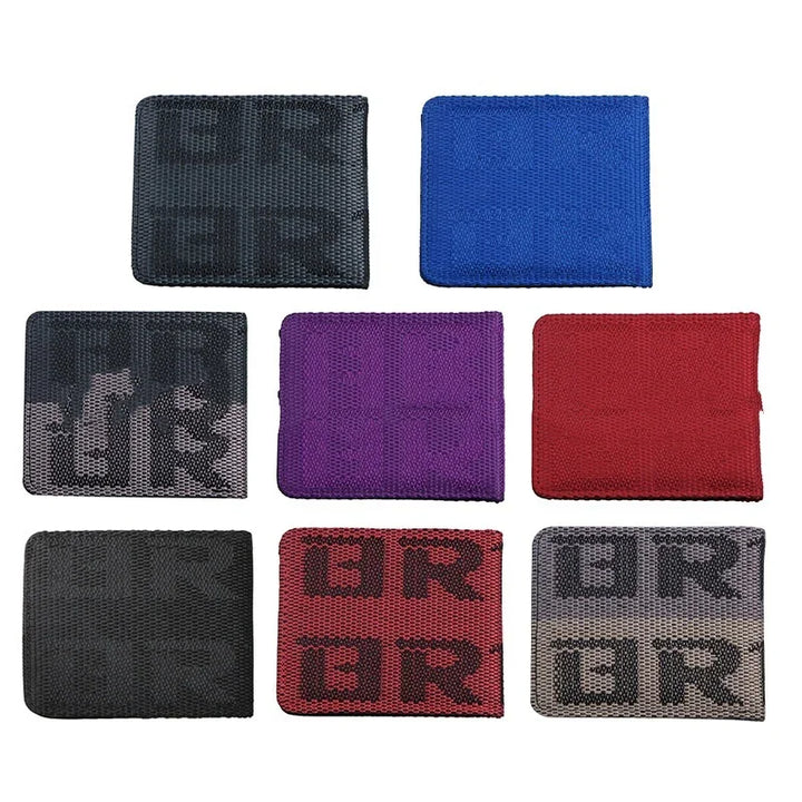 Eight folded mesh wallets in black, blue, purple, red, and gray with block letter patterns